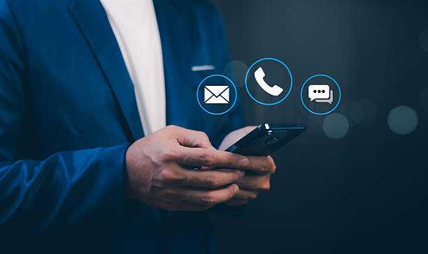 istock Contact us, Professional man using a smartphone to access technology for customer service and online support. business contact and communication assistance across mobile, chat, and email platforms. 2255341173