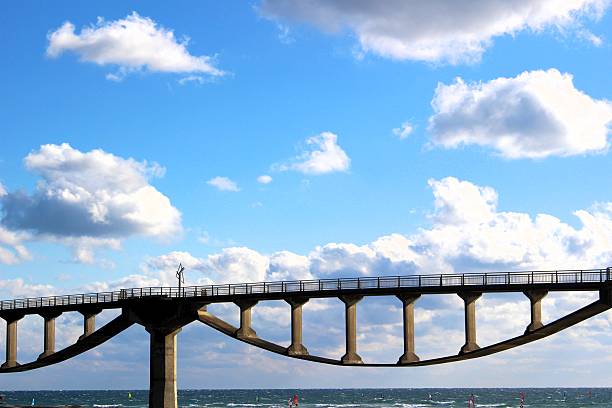 Detailed view of the unique Shiosai Bridge in Shizuoka, Japan. Showcasing modern architectural design and engineering against a winter sky. A symbolic landmark of Shizuoka.