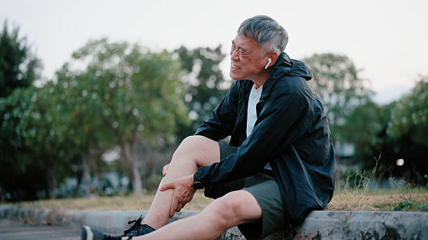 istock Senior man suffering from calf and leg pain after exercise 2255359593