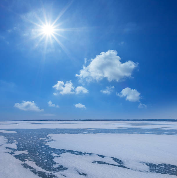istock frozen winter river  at the sunny day 2255361437