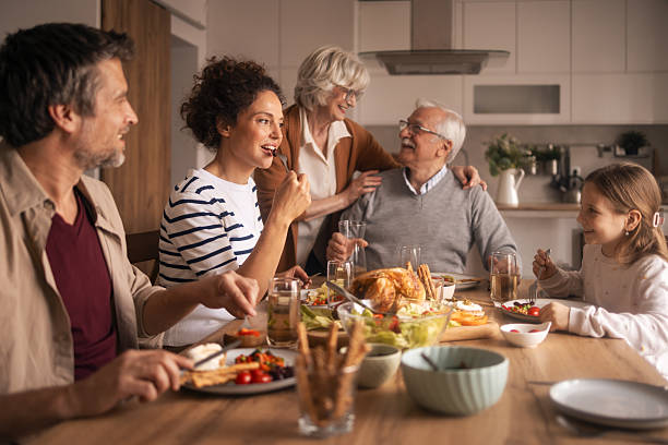 istock Multi-generational people enjoying festive lunch together at home 2255368032