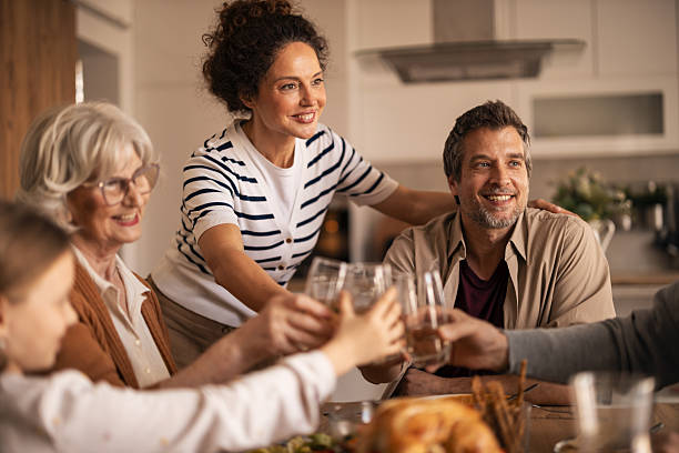 istock Multi-generational family making a toast during lunch 2255368083