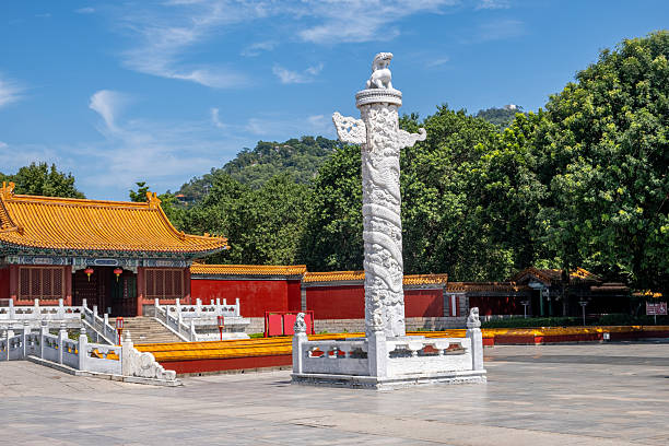 Ornamental column in front of a Chinese palaceThe traditional Chinese palace architecture of the New Yuanmingyuan in Zhuhai Zhuhai City, Guangdong Province