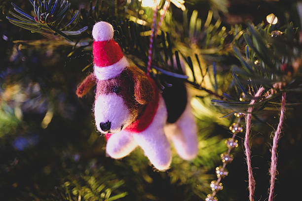 Low angle close-up full frame shot of a large christmas tree with all kinds of decorations on it