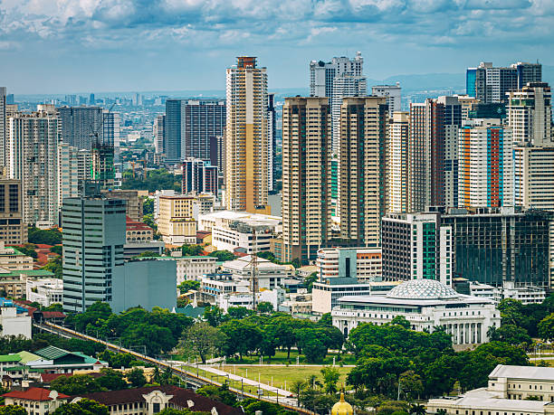 istock Manila Cityscape With Modern Skyscrapers And Park 2255377869