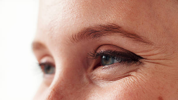 istock Woman, closeup and vision with eyes in studio for eyesight, visual perspective and insight. Female person, retinal focus and lens coordination for perception, clear sight and peripheral awareness 2255384231