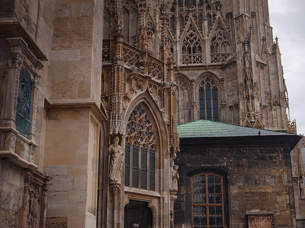 Summer view of Vienna Stephansplatz with iconic cathedral and surrounding old town streets, historic architecture, lively city atmosphere, European travel destination, cultural urban scene.