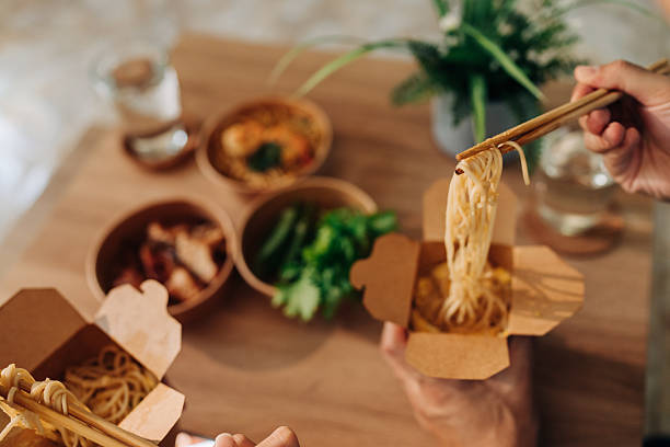 Top view of food delivery noodles eaten together