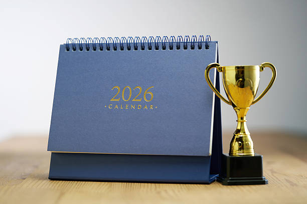 istock desk calendar 2026 and trophy 2255386231