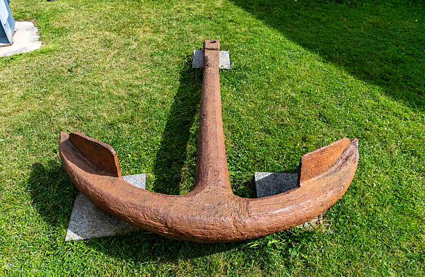 Old rusty anchor with chain isolated on a white background. 3D rendering with clipping path