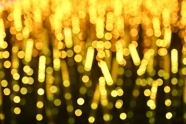 Lighting blur and Bokeh on yellow/golden Background
