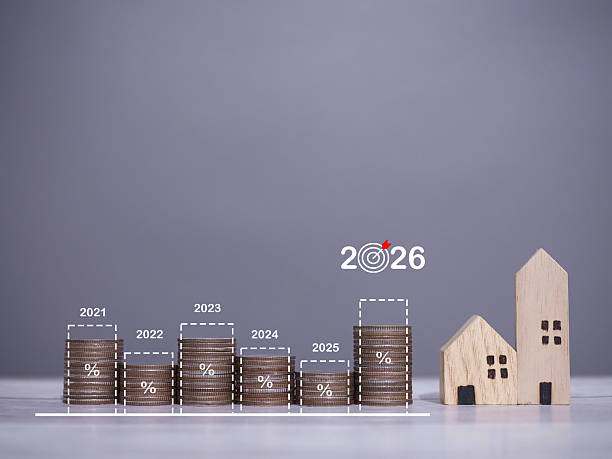 istock Miniature house and stack of coins with virtaul increasing graph. The concept about price of house is growing up, Property investment, House mortgage, Real estate in year 2026 2255392904