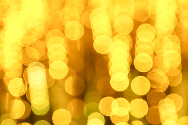 Lighting blur and Bokeh on yellow/golden Background