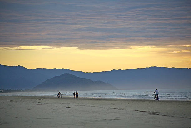 Peruibe, SP, Brazil - May 31st, 2025: Central beach with the famous Praia do Canto and Serra do Itatins buildings on the left.