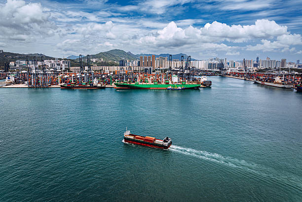 istock Harbor Port Scene With Container Ships and City 2255396188