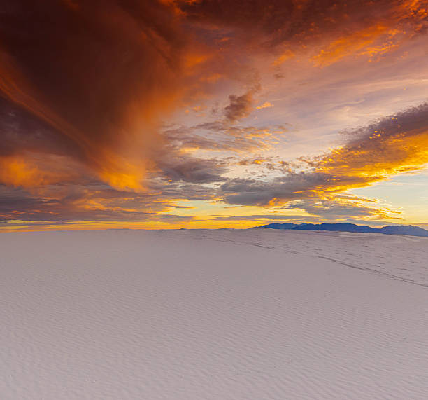 Dramatic Sunset Over The Gypsum Sand Dune and San Andres Mountains, White Sand National Park, New Mexico, USA