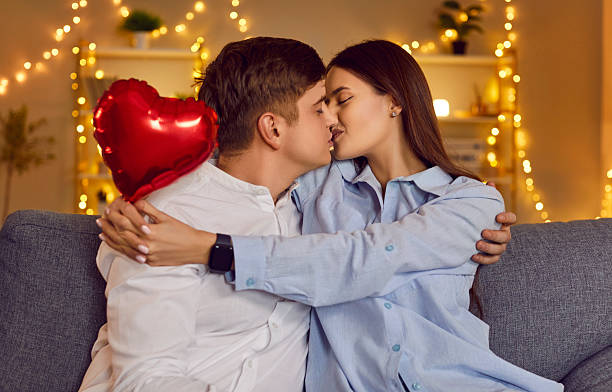 istock Couple Sharing a Tender Kiss on Valentine Day 2255405121