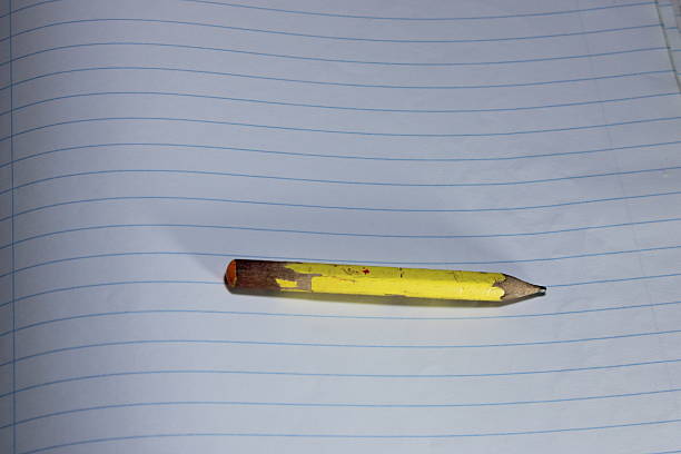 the concept of education by holding a pen