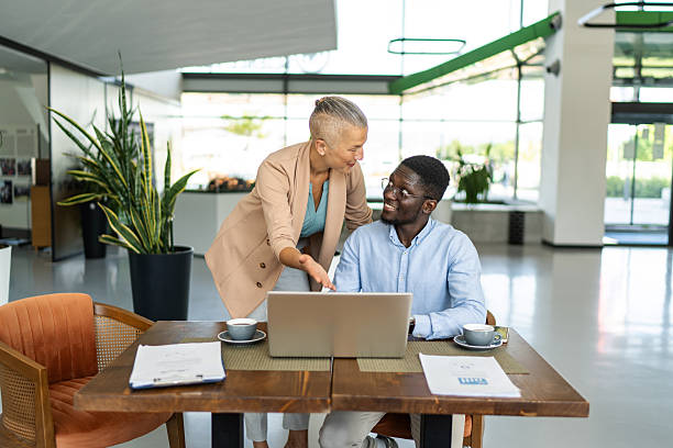 istock Diverse business colleagues collaborating on project in office 2255411106