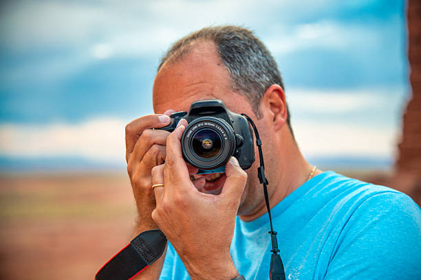 A photographer visiting Monument Valley in Arizona.