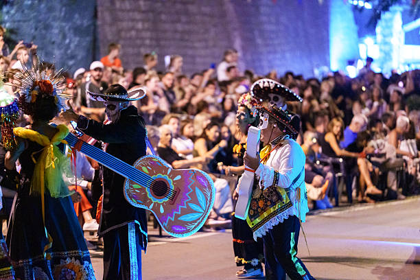 People dressed in costumes and masks during the annual carnival in Kotor, Montenegro. August 2, 2025