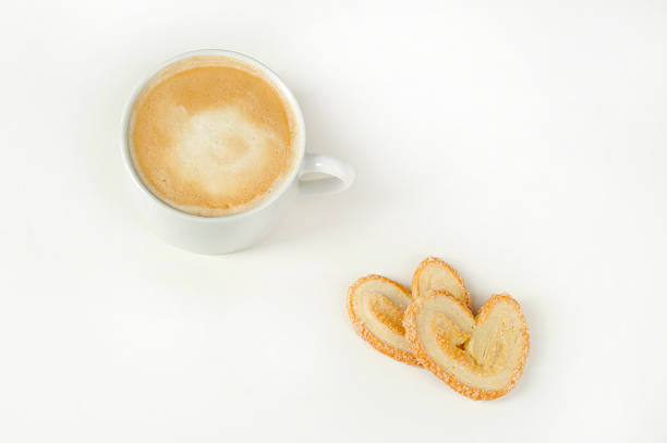 cookies and coffee on a white background top view