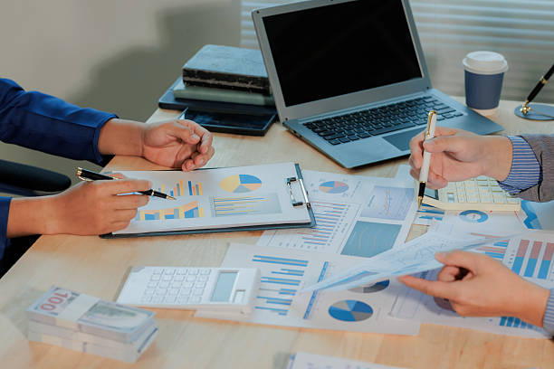 istock Business charts and graphs on a table. Analyzing investment results for growth. 2255437552