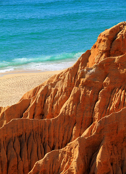Portugal, Alentejo Region, Melides. clifftop view of a beautiful, deserted, pristine beach and the Atlantic Ocean near the village of Melides on Portugal's South West coast.