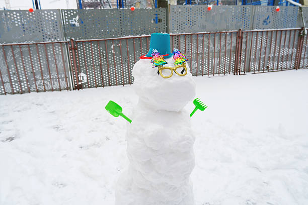 Snowman with Colorful Decorations and Winter Fun