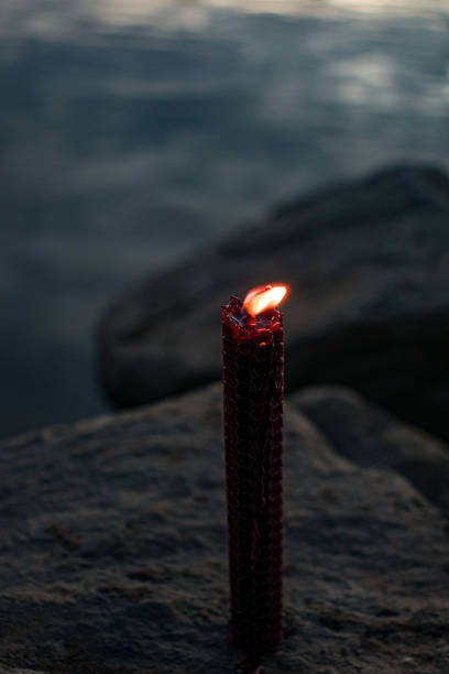 Close-Up Of Flame Against Black Background
