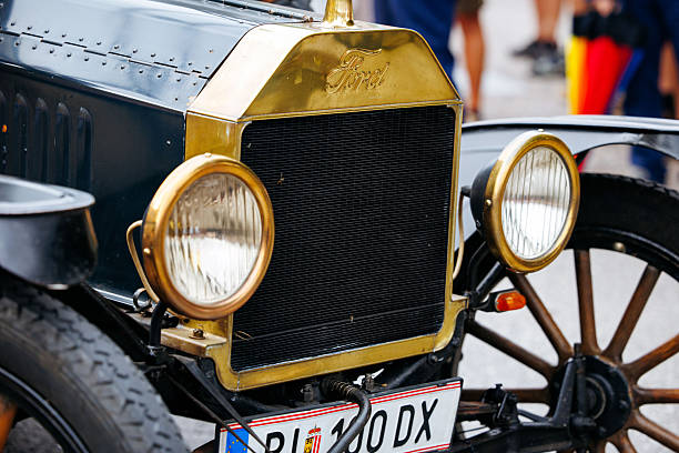 black retro car on yellow color background