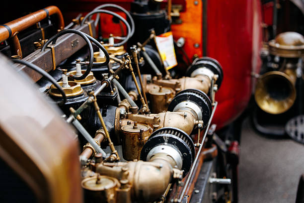 Fiat 126p engine with carburetor, fuel lines and air-cooling system photographed inside the opened rear vehicle compartment