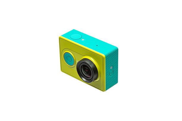Compact action camera in bright turquoise and lime green isolated on white.