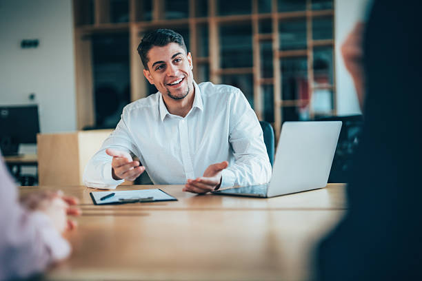 istock Client consultation in modern minimalist office space. Supplier meeting. 2255464246