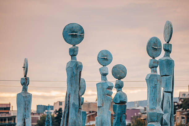2 November 2025, Tbilisi, Georgia: Public art installation with blue abstract statues with clocks
