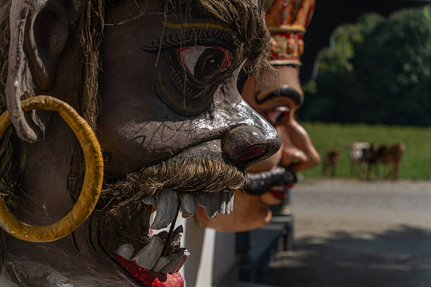 At the entrance of a satra on Majuli Island in Assam, India, vibrant traditional masks stand watch. Their bold expressions and intricate details reflect the island’s rich Vaishnavite heritage and the ceremonial artistry of the Mising community.