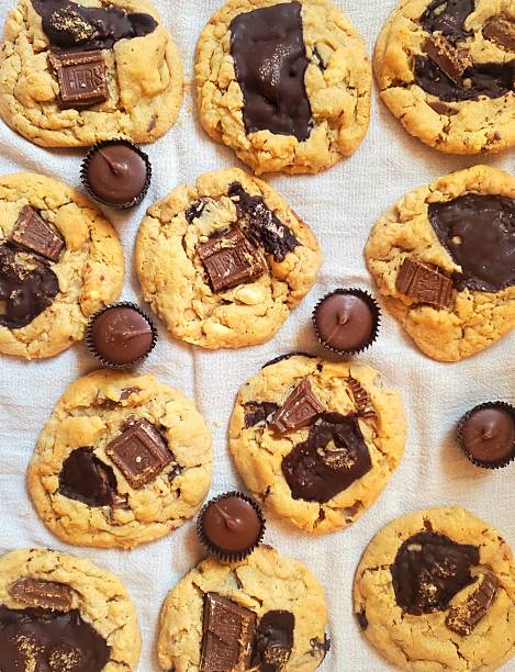 Freshly baked cookies with a golden-brown finish and chocolate chips. Perfectly crisp on the edges with a soft center, offering a delicious, comforting treat for any occasion.