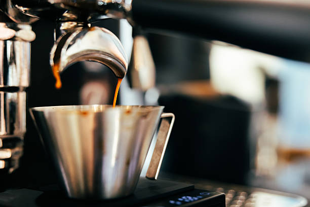 Close-up brewing espresso.