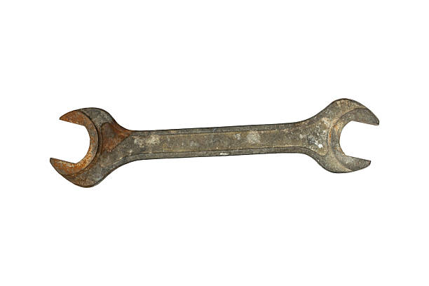 Vintage Rusty Double Open-End Wrench on White Background for Industrial and Mechanical Concepts