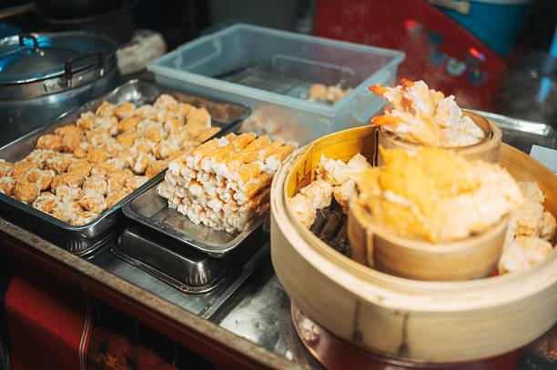 variety of colorful dim sum dishes freshly prepared in bamboo steamers authentic oriental cuisine