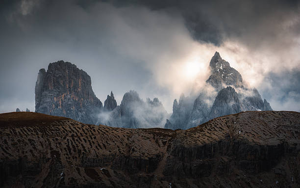 istock Moody rugged mountain peak with misty in Tre Cime, Dolomites 2255502661