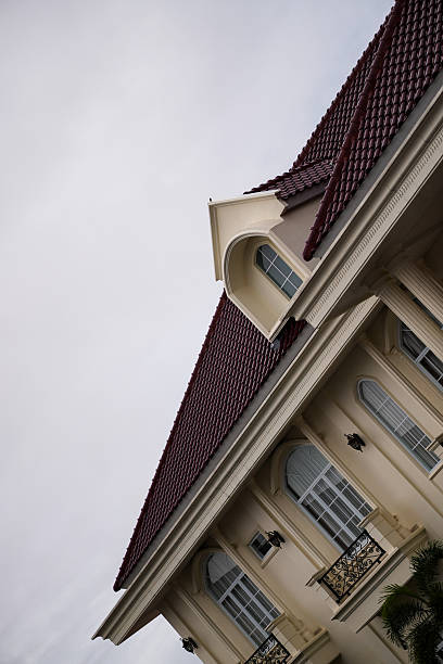 Classic residential architecture of the Czech Republic and Europe features ornate facades, windows, detailed cornices, and symmetrical layouts.
