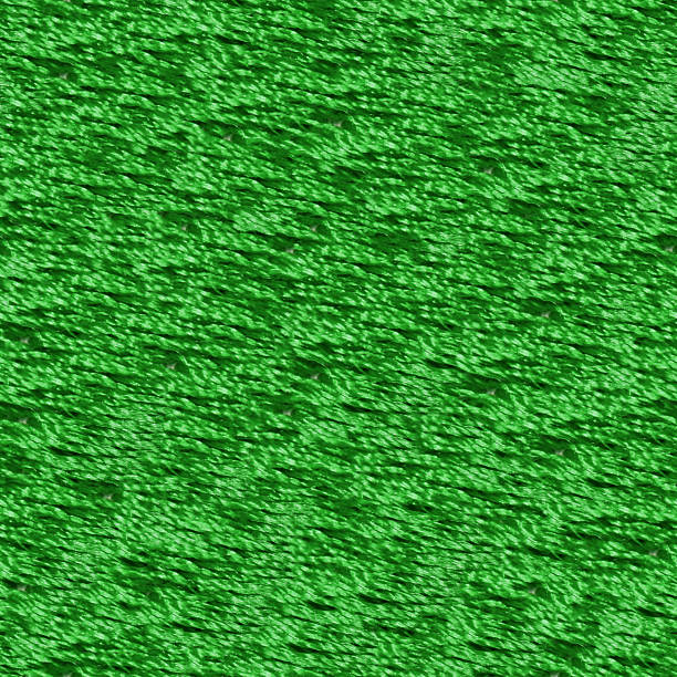 Seamless texture of embroidered fabric with red threads. Geometric tessellated surface. Seamless repeating pattern.