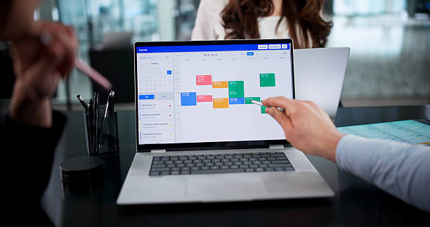 istock Busy Corporate Executives Scheduling Online Appointments And Meetings 2255524709