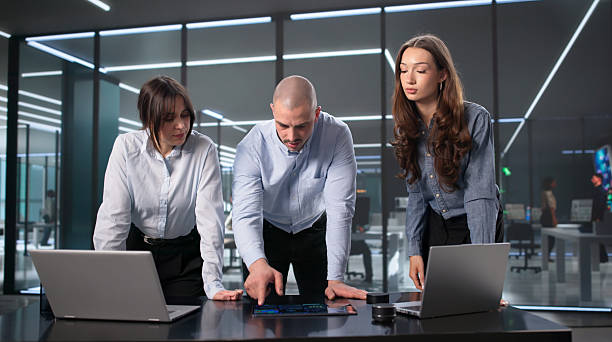 istock Team Of Women Discussing Business Solutions 2255527474
