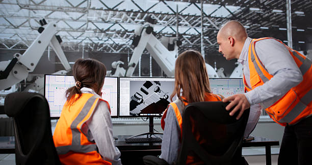 istock Female Engineer Leading Team In Designing Electric Car 2255527509