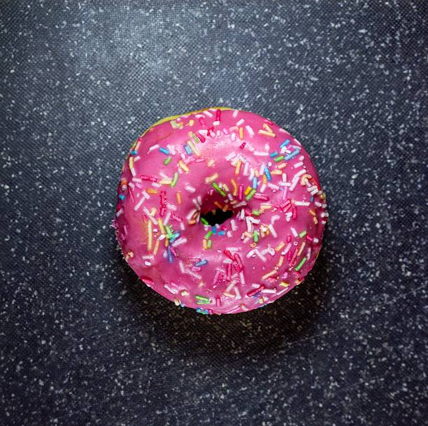 Sweet indulgence captured in vibrant detail. This treat promises joy and deliciousness, perfect for celebrating lifes little moments