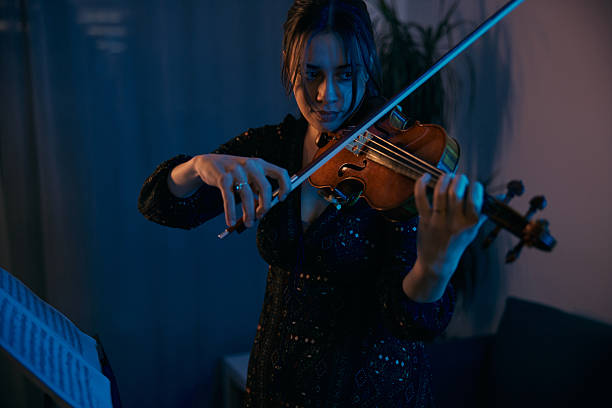 istock Female Violinist is Preparing for a Concert 2255529500