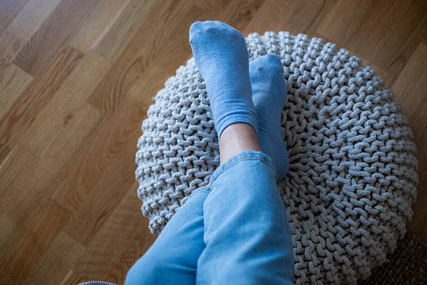 legs in woolen socks