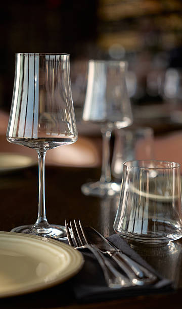 istock Elegant Table Setting with Modern Glassware and Fine China 2255535581